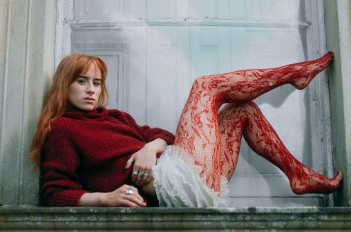 Aisling Sharkey in sheer red lace tights